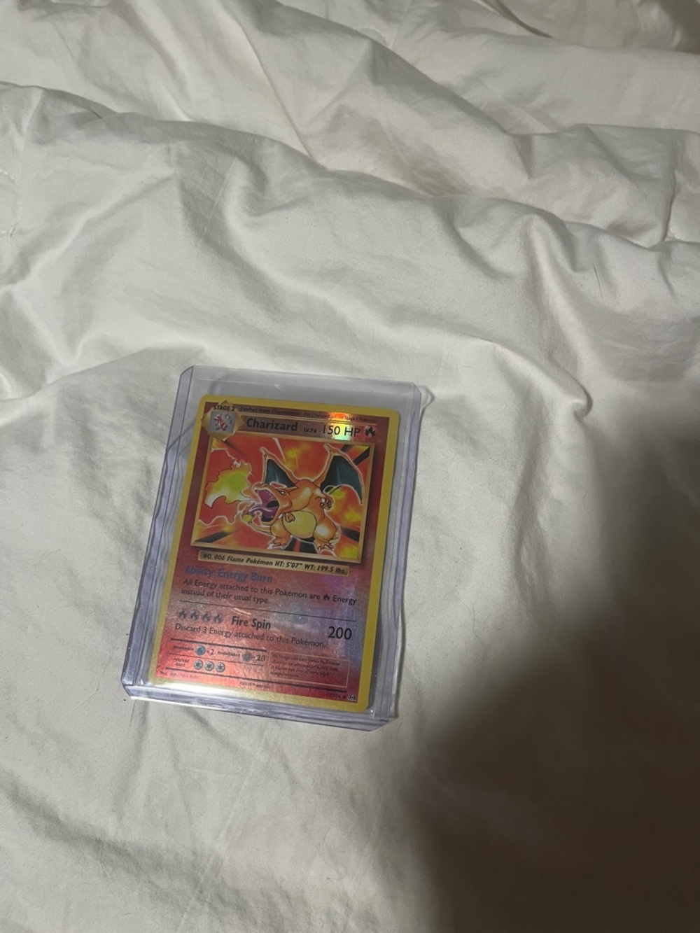 Pokemon Charizard Trading Card - Red, Yellow, Orange